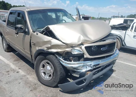 2001 Ford F-150 King Ranch Edition/Lariat/Xlt z USA, uszkodzony, nr VIN 1FTRW08L31KD87783